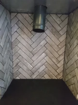 Herringbone fireplace tiling